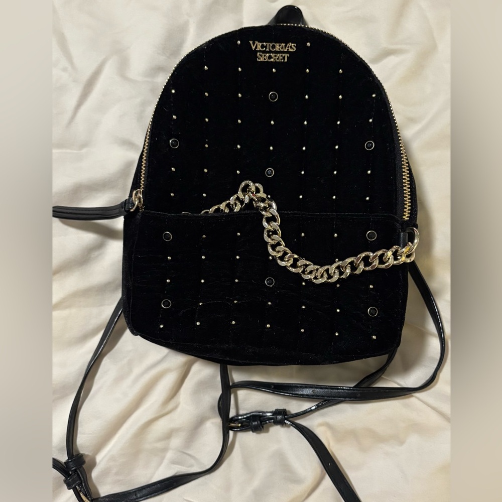 Black Quilted Backpack with Chain Detail